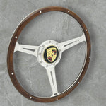 Wood rimmed steering wheel with chrome spokes for VW Beetle, Karmann Ghia, Squareback, Notchback, Thing and Porsche 914 with Porsche Logo horn button. 